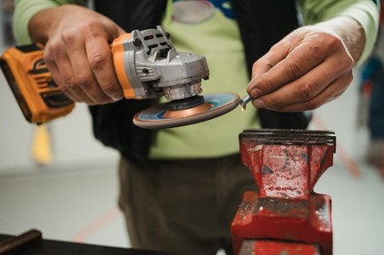 grinding converter material